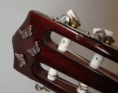 Blue Jean Baby Guitar sculpture, headstock